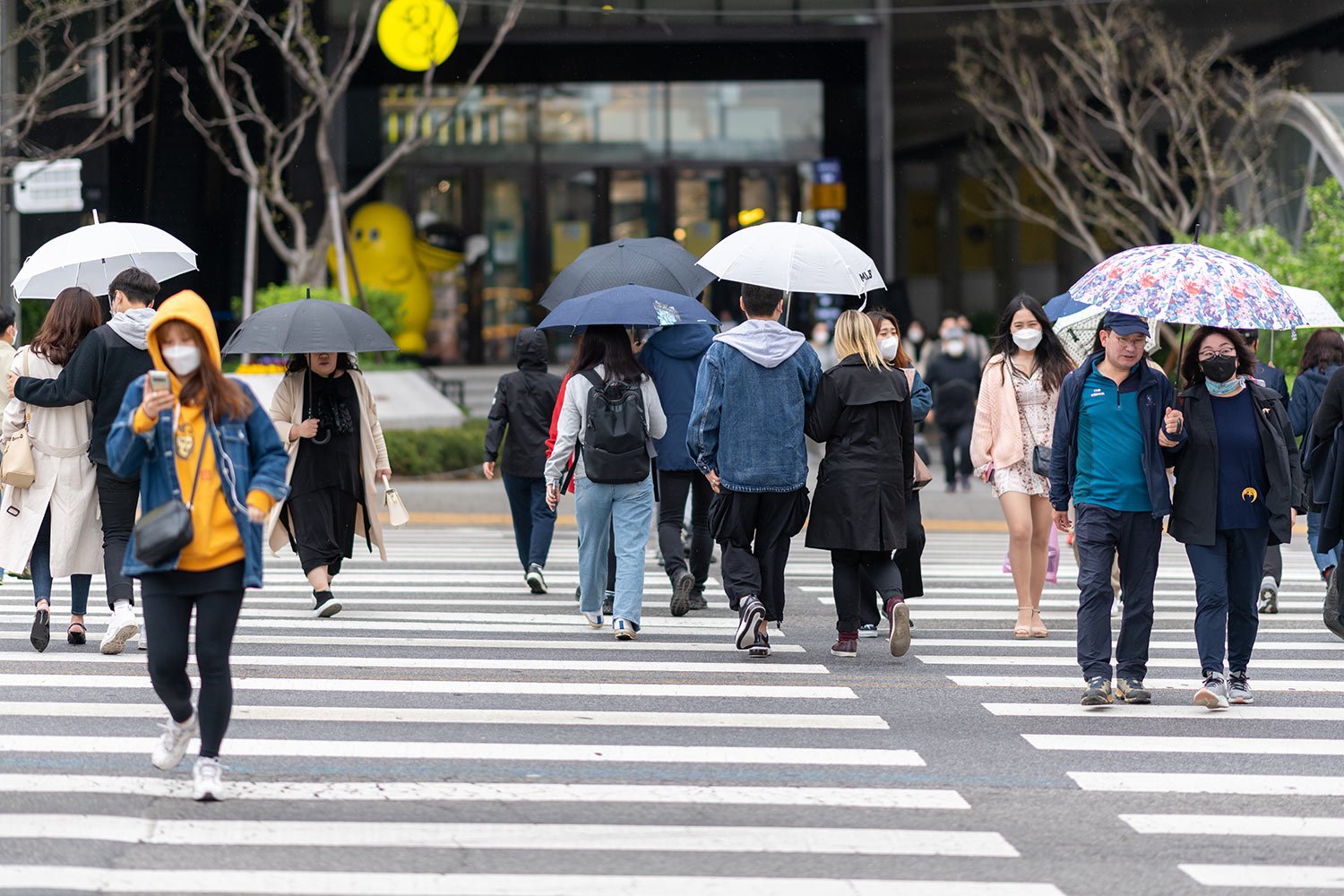 South Korea PM urges calm after Covid cases soar by 70,000 in a day